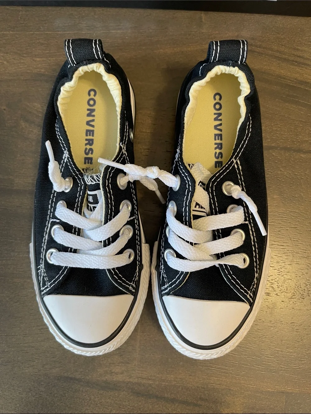Converse Kids Low Top Sneaker in Black and White